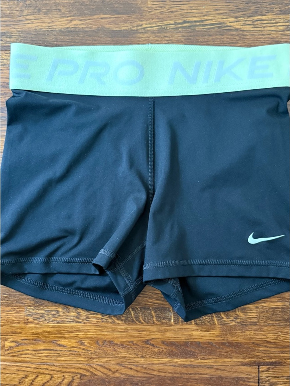 Nike Black Shorts with lemomade Waistband and Swoosh size small women